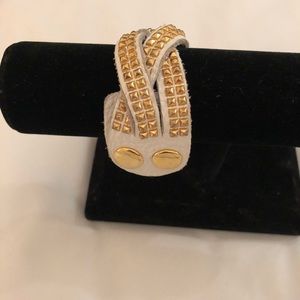 White leather bracelet with gold detail